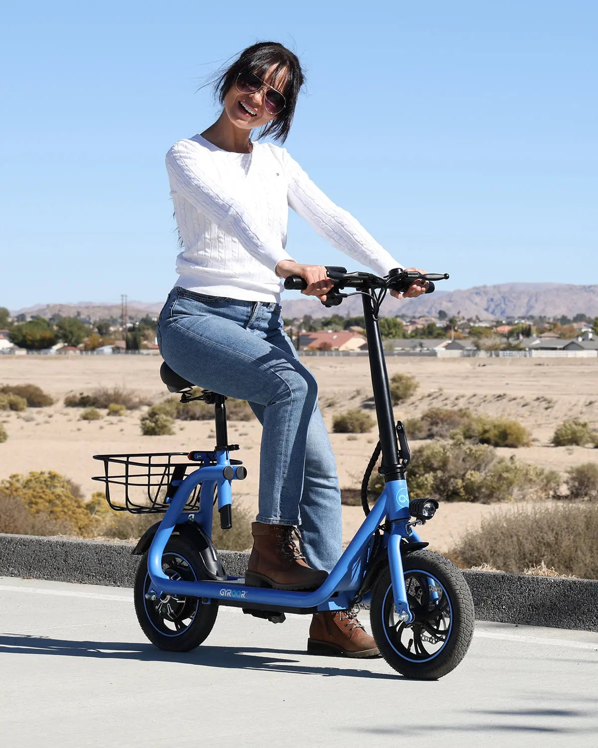 Gyroor C1 foldable electric scooter with seat, folded for storage