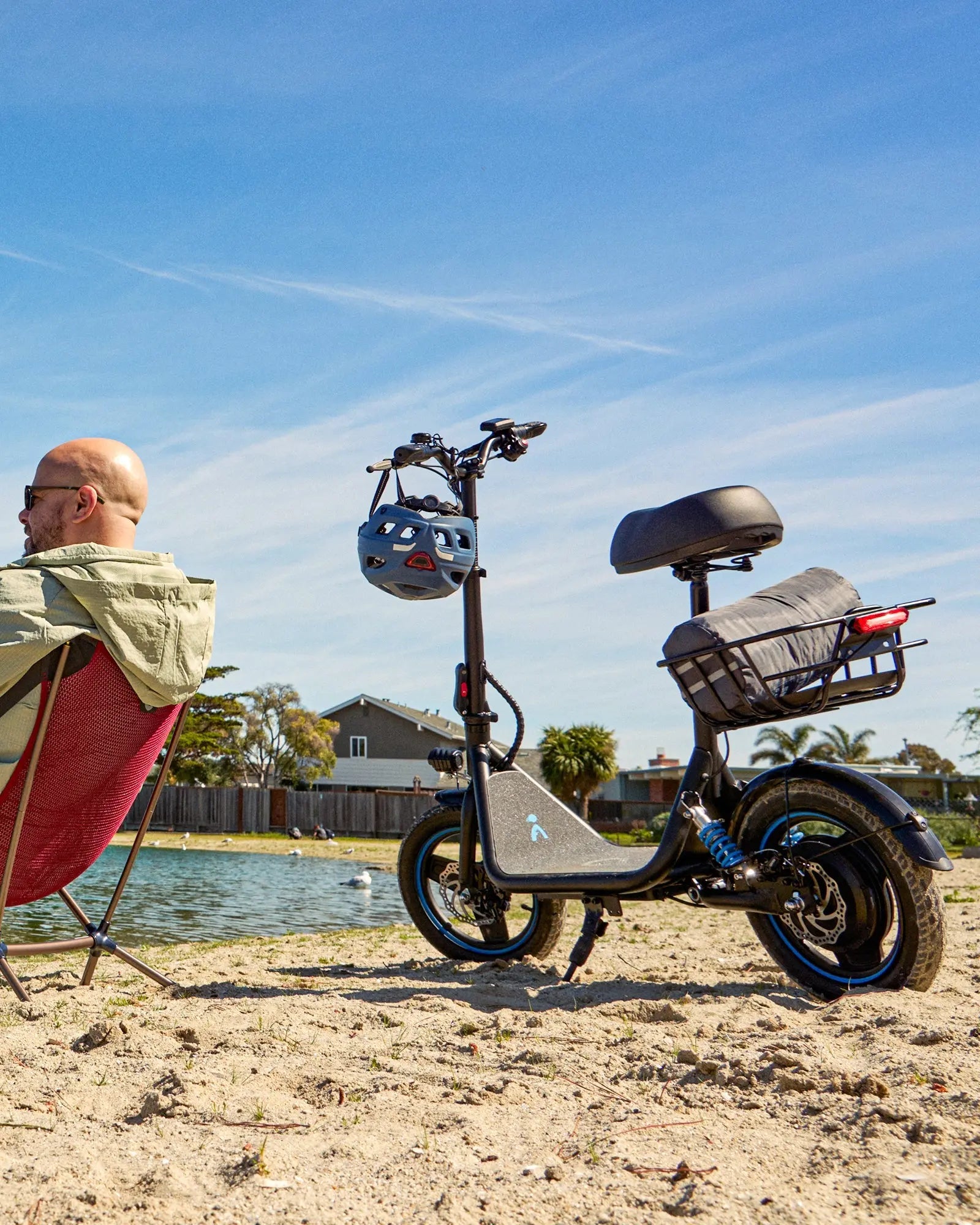 Adult riding the Gyroor C1Plus electric scooter for urban commuting