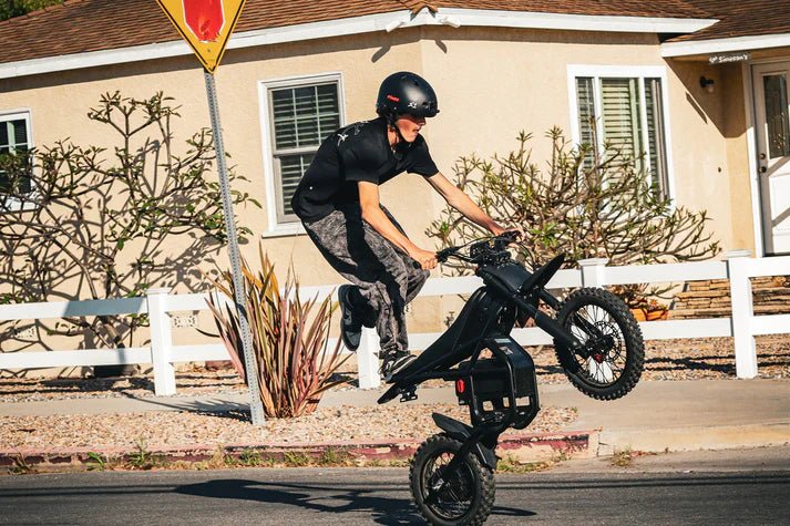 Rider riding Gyroor GT54Pro electric dirt bike at 49MPH top speed