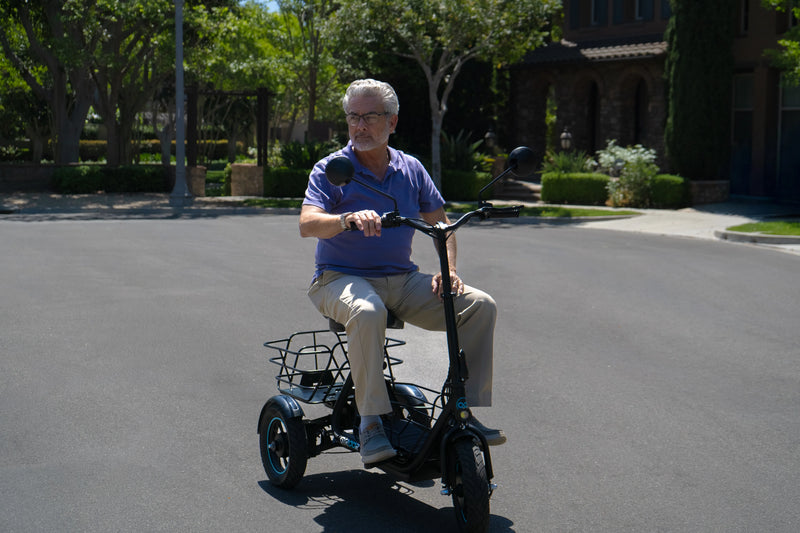 Senior rider enjoying the Gyroor C5 electric trike for comfortable neighborhood commuting