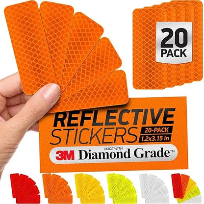 Set of 20 high-visibility reflective safety tape stickers in orange with diamond-grade reflective material, ideal for vehicle safety, 1.2x3.15 inches each.