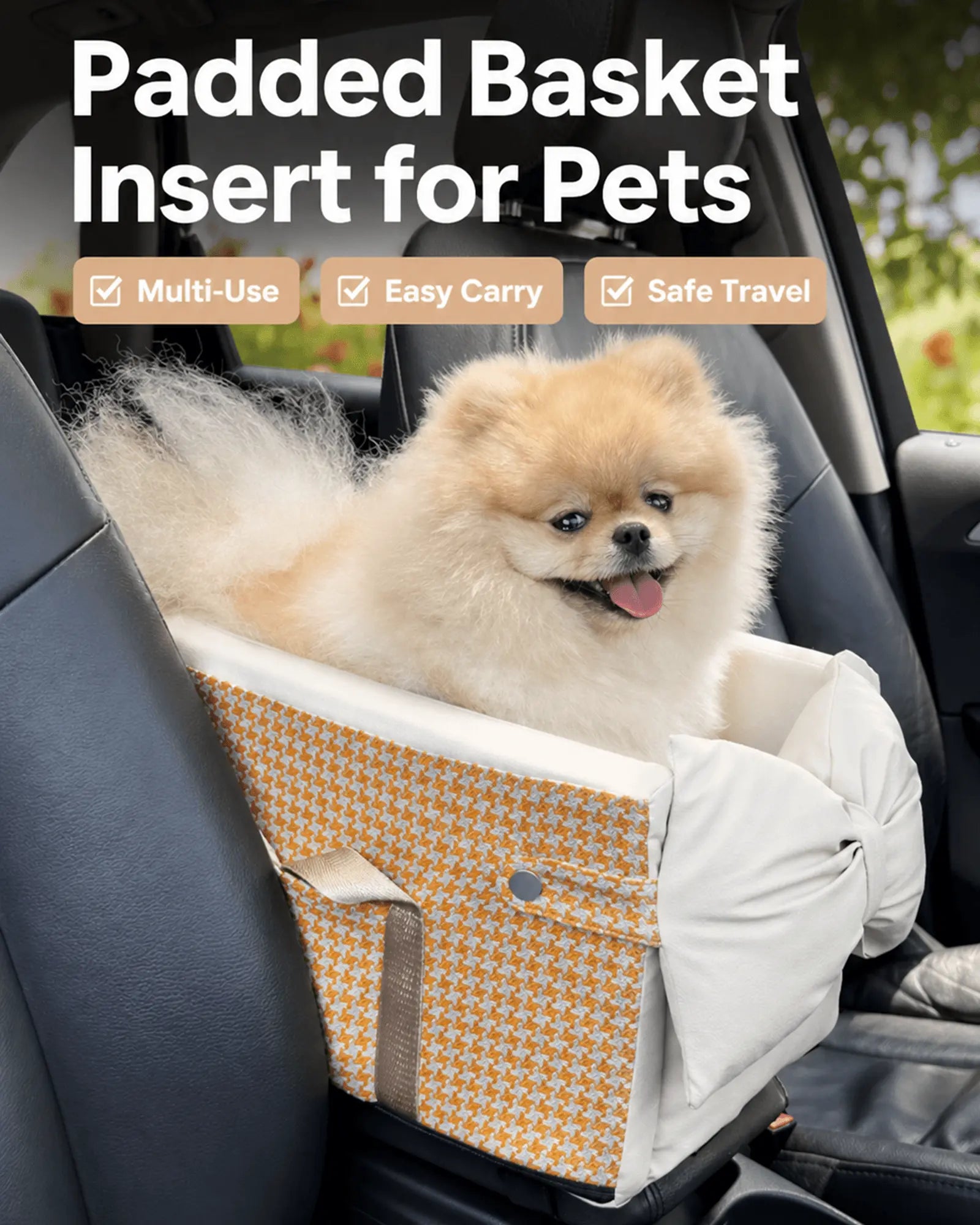 Padded pet basket insert with orange and white houndstooth pattern, secured with gray straps, designed for car travel with a fluffy Pomeranian puppy inside