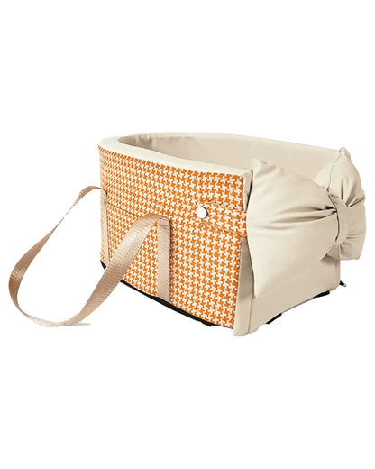 Orange and beige houndstooth padded pet carrier insert with beige straps and cream fabric edges, designed for pet safety and comfort
