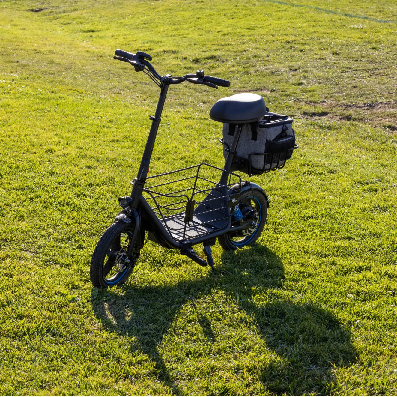 Gyroor C1Plus 1000W electric scooter front three-quarter view with padded seat and dual baskets