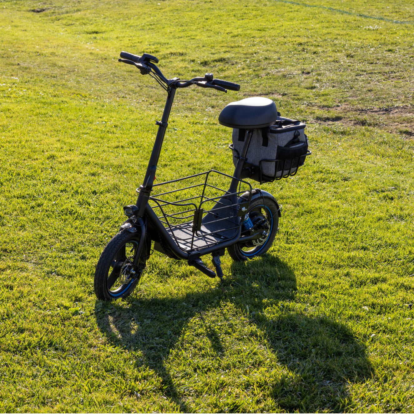 Gyroor C1Plus 1000W electric scooter front three-quarter view with padded seat and dual baskets